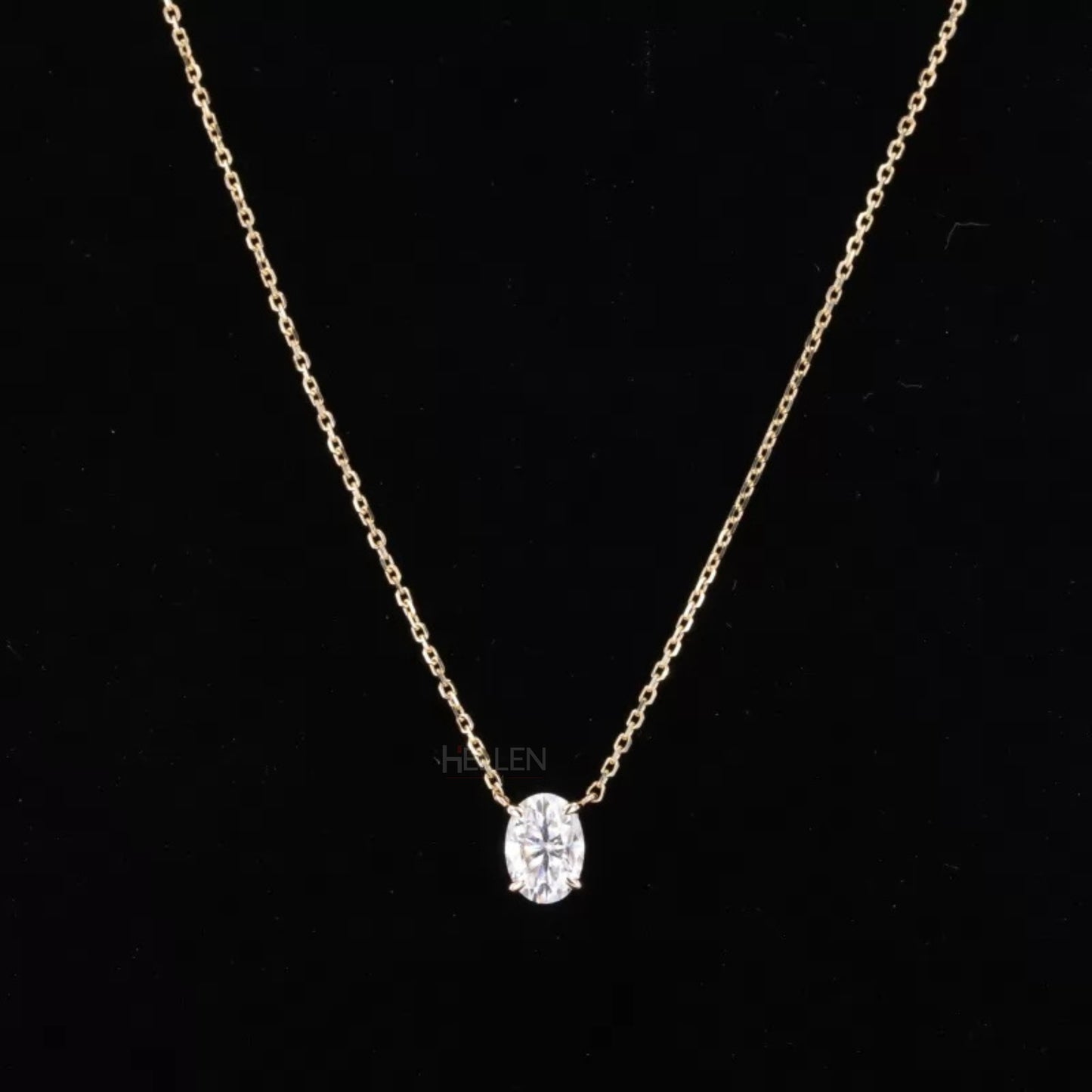 Oval cut solitaire moissanite necklace with 4 prongs and dual loop design – classic elegance with secure setting