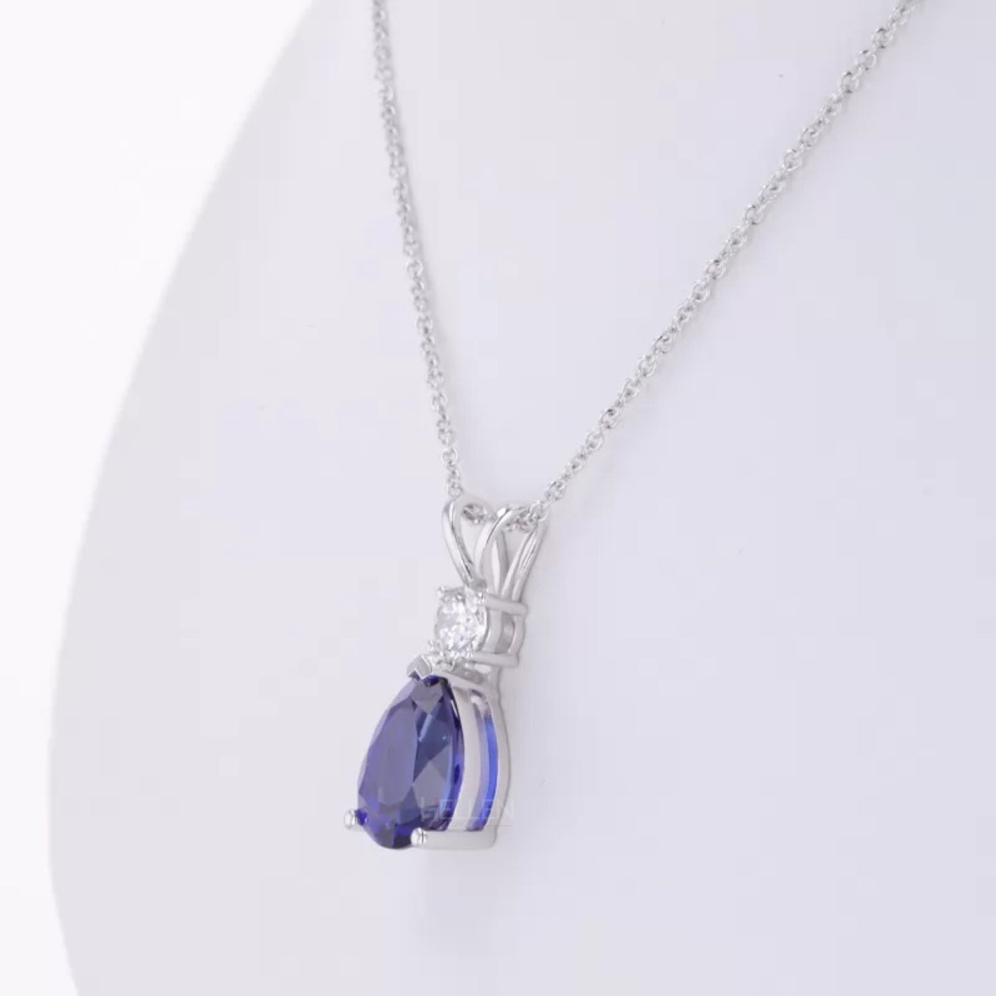 Pear Cut Blue Tanzanite Drop Necklace With Round Moissanite