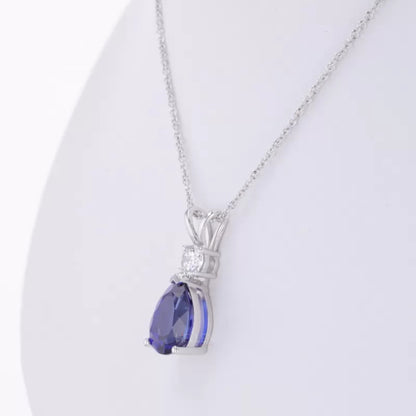 Pear Cut Blue Tanzanite Drop Necklace With Round Moissanite