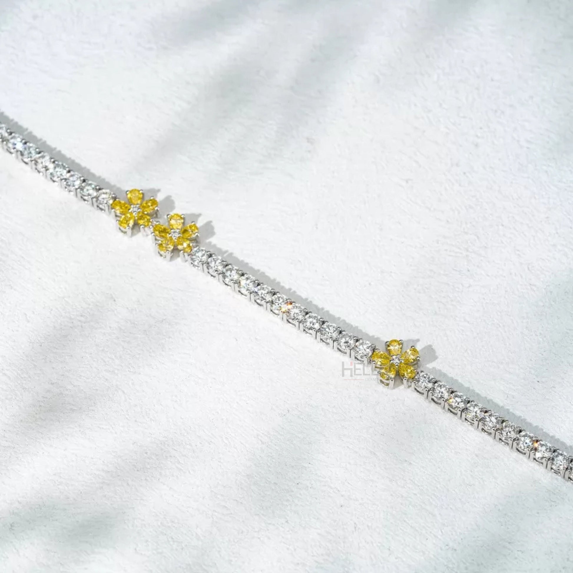 Whimsical floral bracelet with round moissanite and yellow sapphire pear accents – colorful and feminine wrist jewelry

