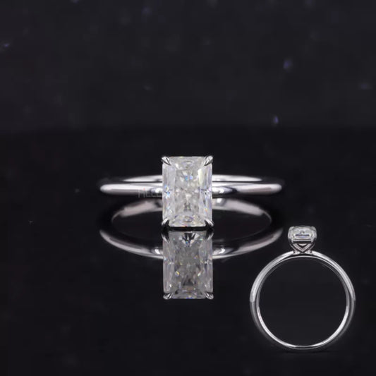 Striking radiant cut moissanite solitaire ring with tiger prong setting – unique and powerful engagement design