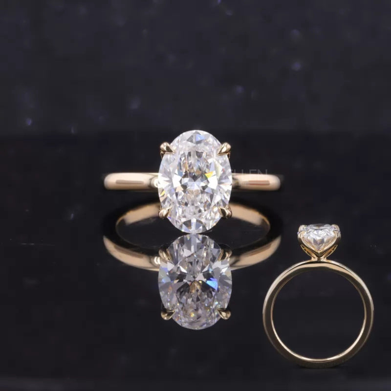 Oval cut solitaire moissanite engagement ring with tulip-inspired setting – romantic and floral bridal ring