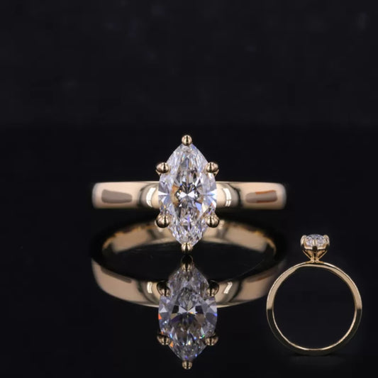 Colorless marquise cut moissanite solitaire engagement ring – graceful and elongated shape for elegant proposals

