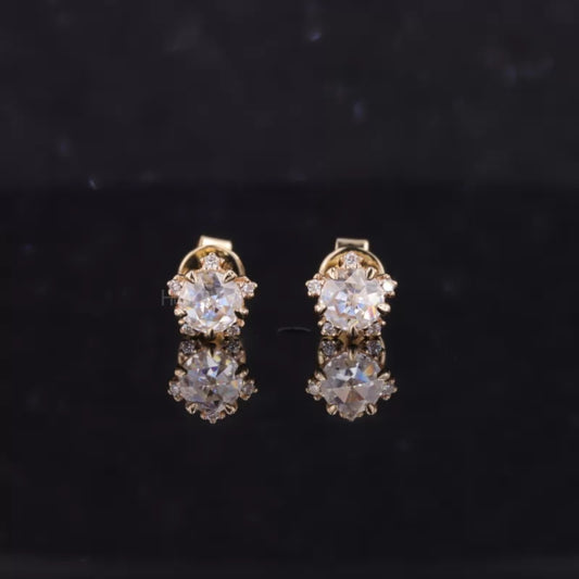 Snowflake-inspired studs with rose cut round moissanite – delicate shimmer with winter elegance