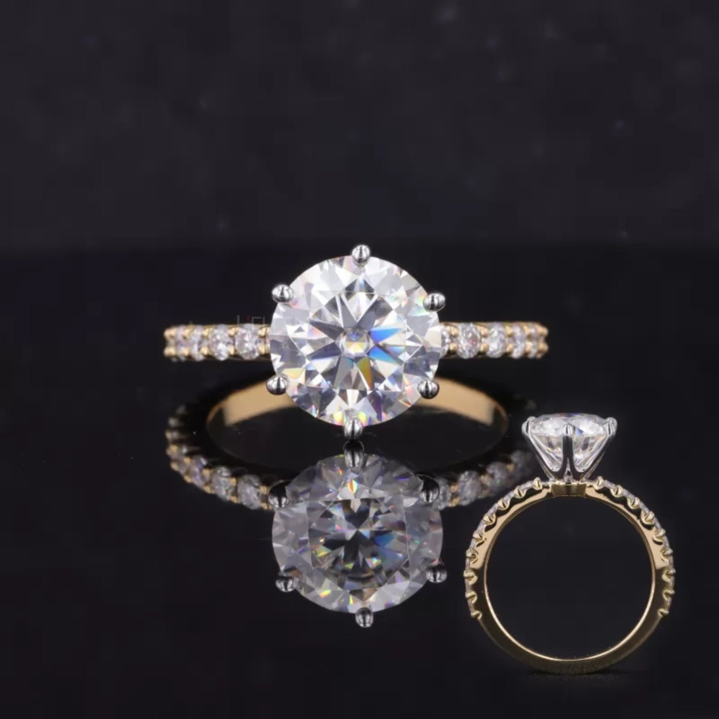 Two-tone engagement ring with round moissanite solitaire and diamond-studded shank – chic and luxurious contrast
