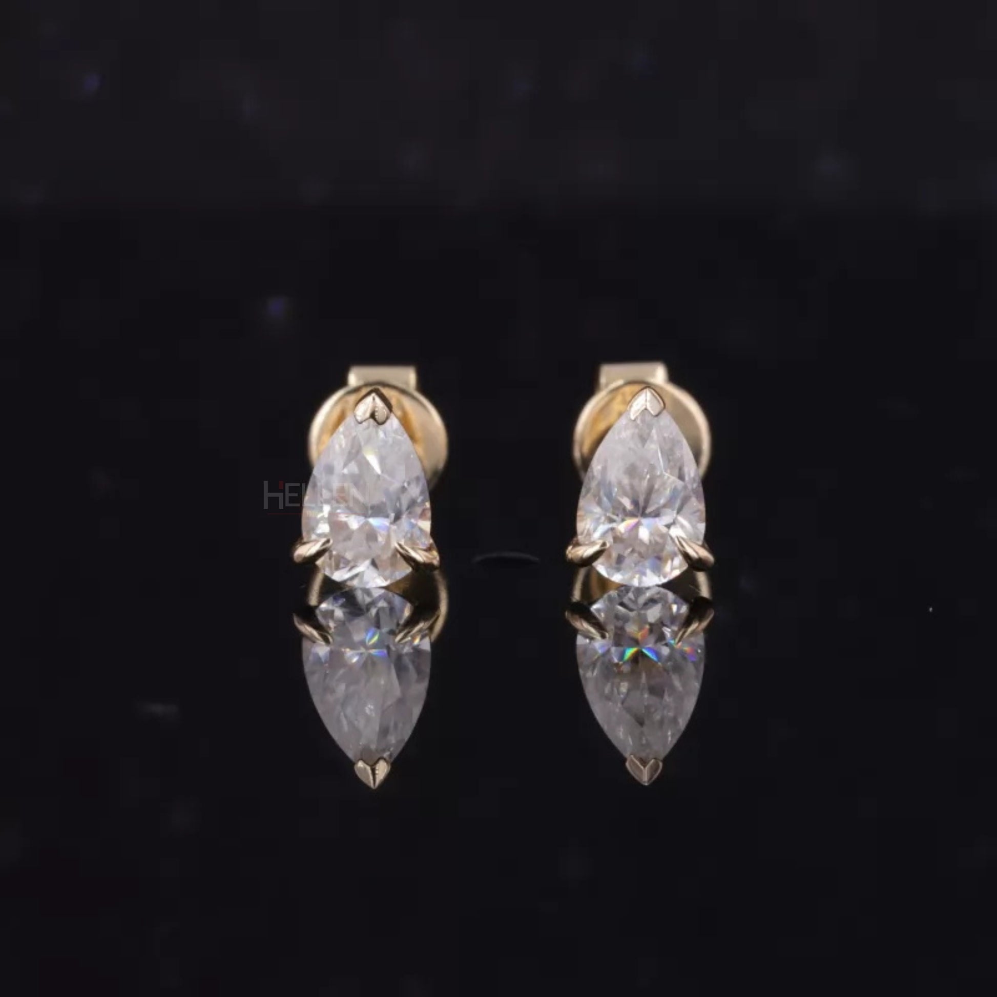 Luxury sterling silver studs with pear cut moissanite – elegant teardrop shape for refined style