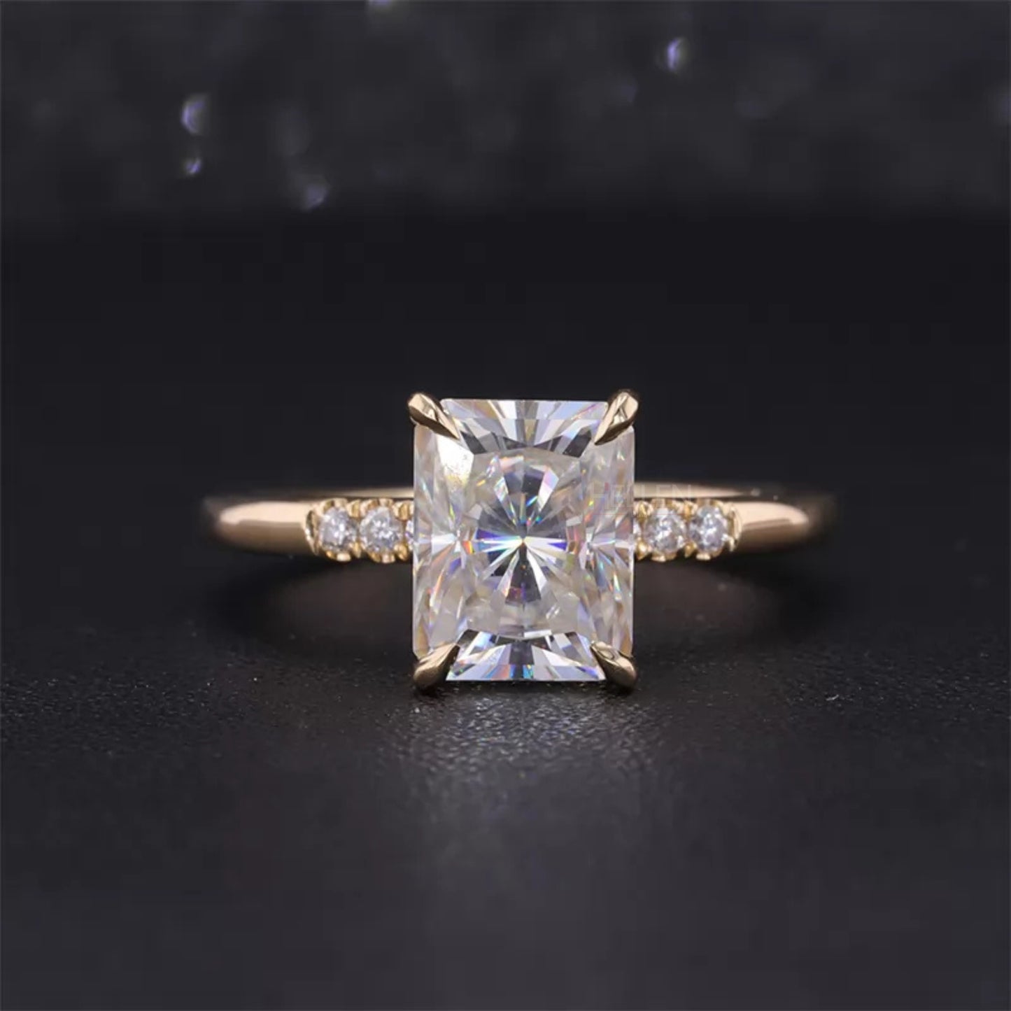 Radiant cut moissanite solitaire engagement ring with pavé diamonds – bold brilliance and classic detailing