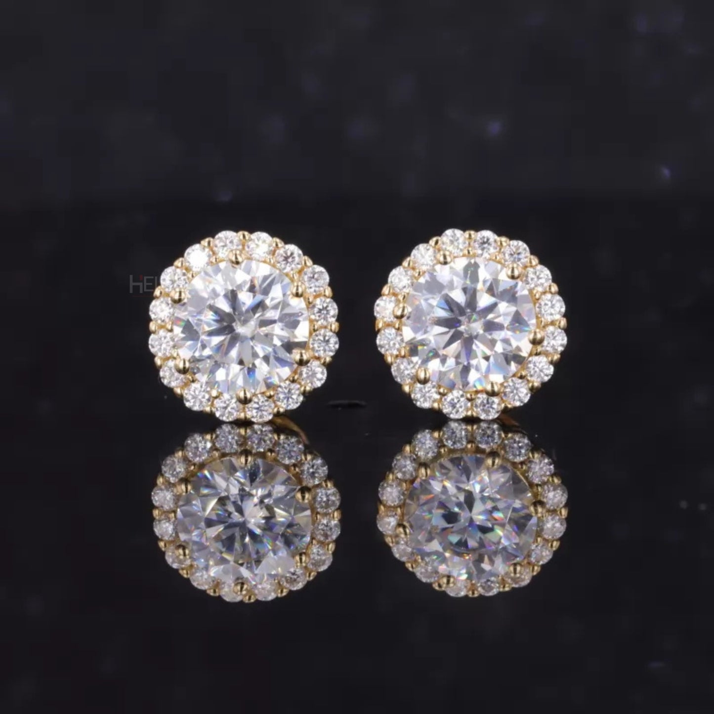 Halo studs with round cut moissanite in sterling silver – timeless sparkle with added brilliance