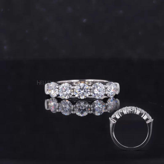 Five round cut moissanite stones in a wedding band – radiant and classic bridal design