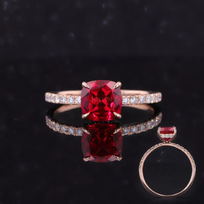 Red ruby ring with cushion cut moissanite and pavé diamonds – vibrant and bold gemstone engagement design