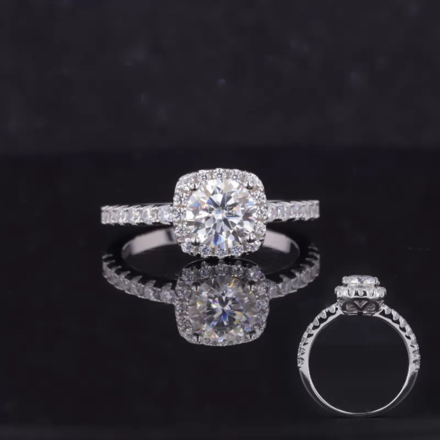 Round cut moissanite solitaire ring with cushion illusion halo – modern twist on a vintage-style design