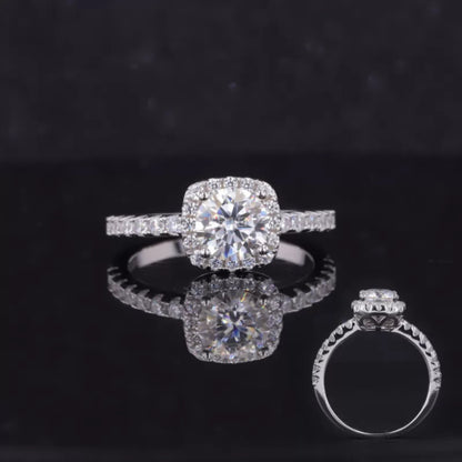 Round cut moissanite solitaire ring with cushion illusion halo – modern twist on a vintage-style design