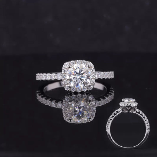 Round cut moissanite solitaire ring with cushion illusion halo – modern twist on a vintage-style design