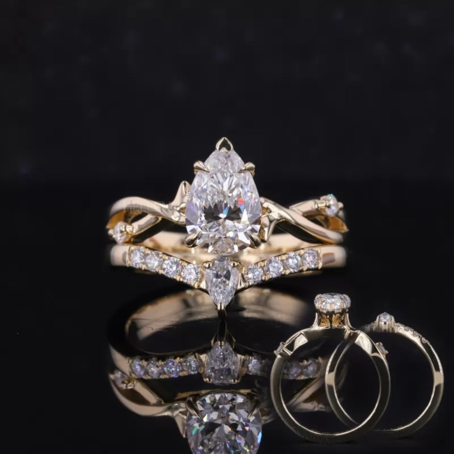 Bridal ring set with pear and round moissanite stones – balanced elegance with unique stone pairing


