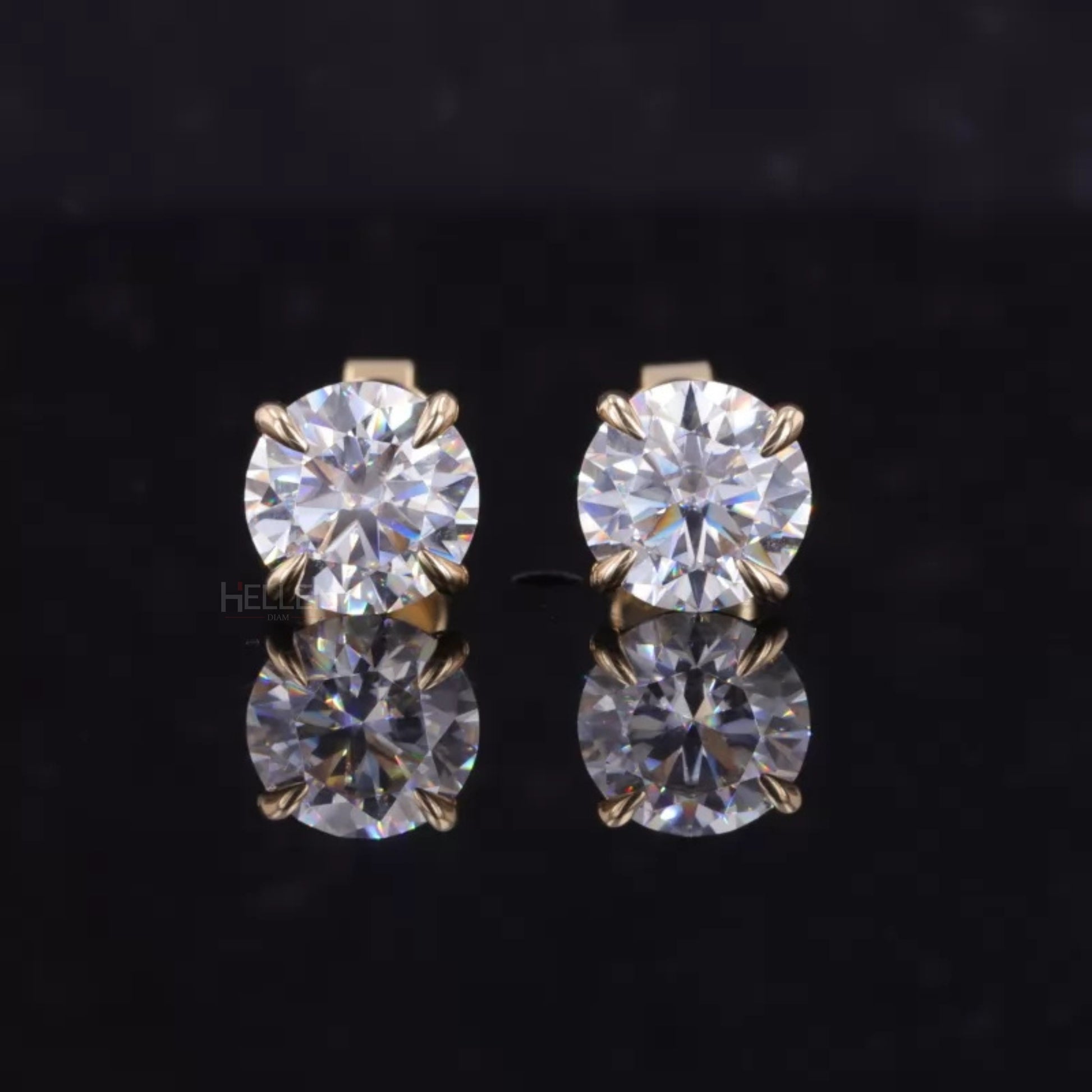 Classic round cut VVS moissanite studs with 4 claw prongs – everyday brilliance in sterling silver