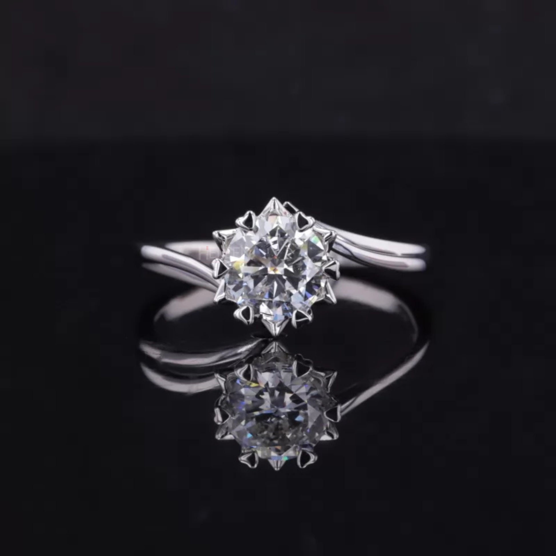 Romantic floral-inspired round cut moissanite solitaire ring with heart-shaped prongs – perfect for proposals or anniversaries
