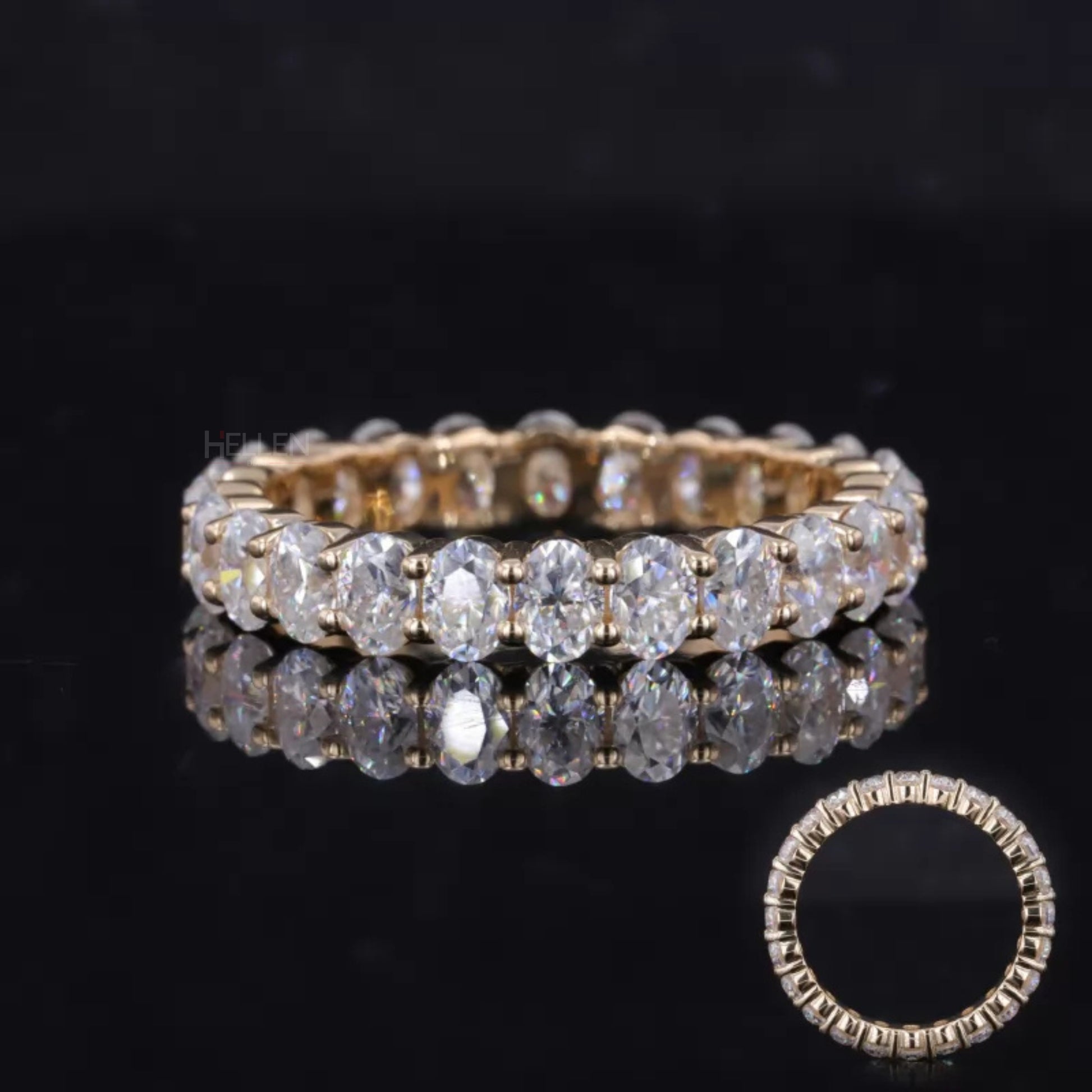 Full eternity band with oval cut moissanite and shared prongs – continuous shimmer with elongated elegance

