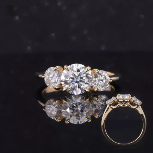 Round cut moissanite 3 stone engagement ring – symbolic past, present, future design in elegant setting

