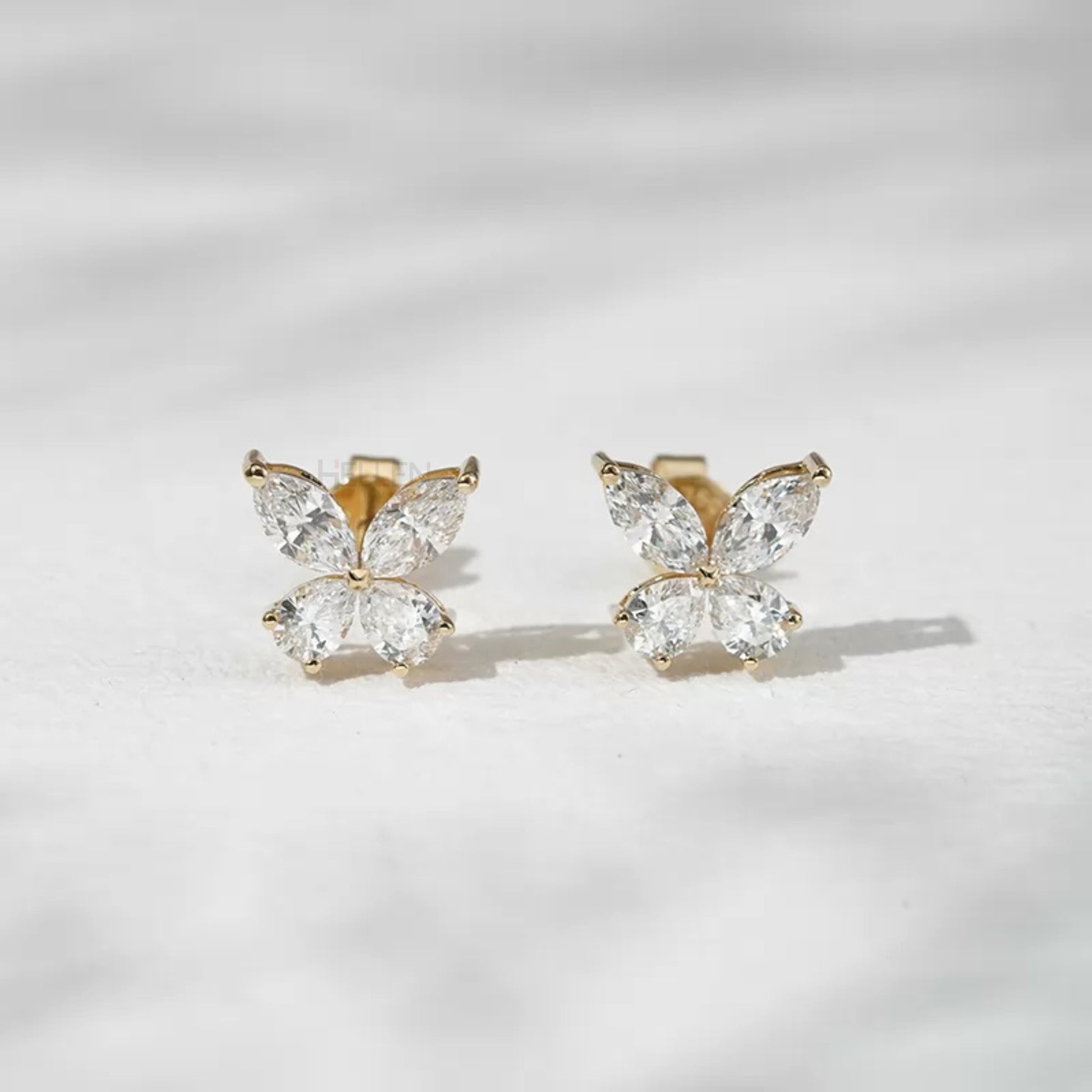 Marquise cut moissanite studs with butterfly-inspired design – feminine and graceful for daily wear

