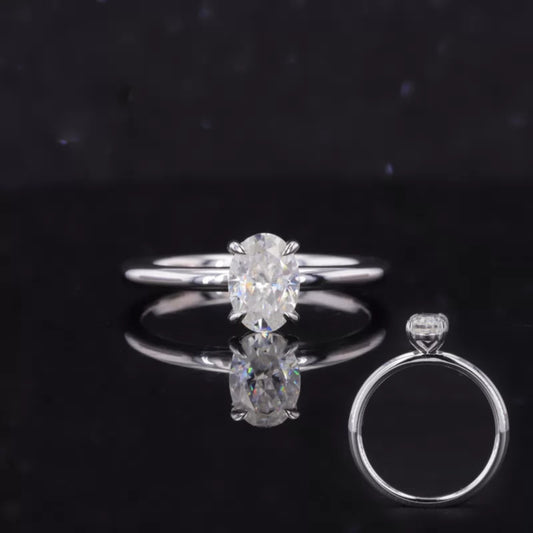Oval cut moissanite solitaire engagement ring with tiger prongs in 925 silver – dramatic and unique bridal ring