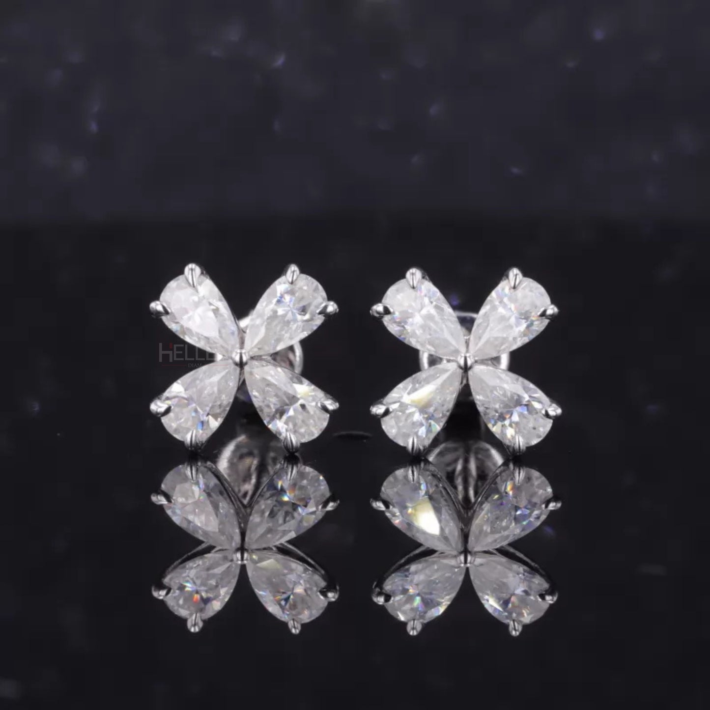 Teardrop-shaped pear cut moissanite studs in sterling silver – refined sparkle for sophisticated styling