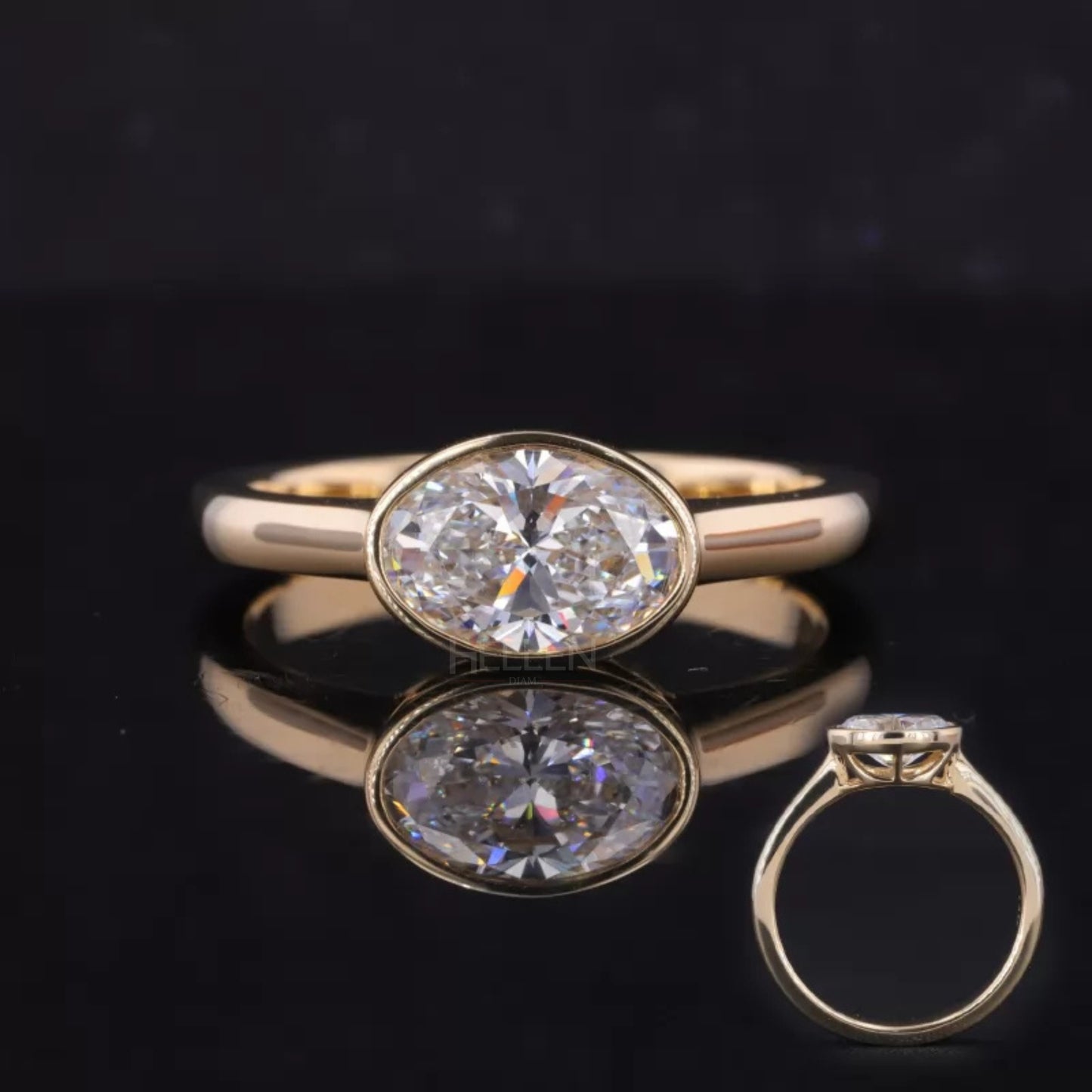 East-west bezel set oval cut moissanite solitaire engagement ring – sleek and modern engagement style