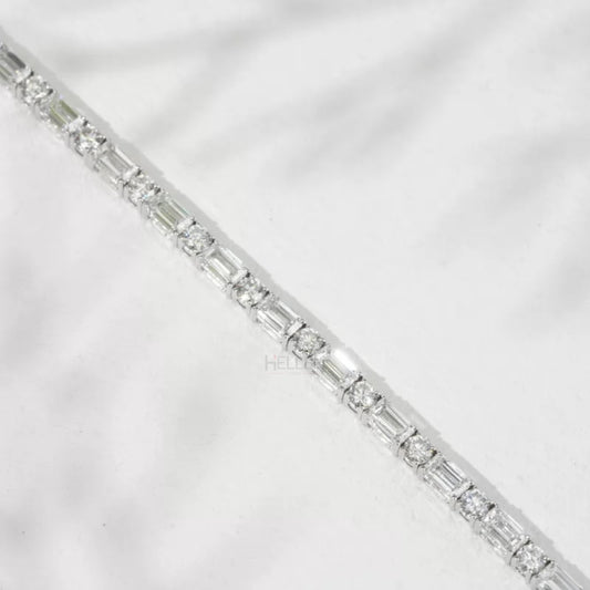 East-west set emerald and round cut moissanite tennis bracelet in 925 sterling – elegant and vibrant design