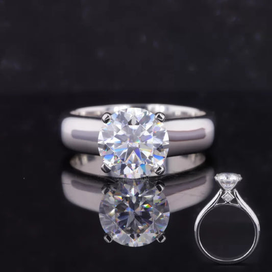 Round cut moissanite solitaire engagement ring with hidden halo – timeless brilliance with a modern twist

