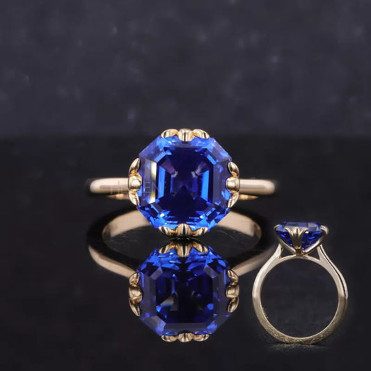 Blue sapphire solitaire engagement ring with Asscher cut and leaf prong setting – nature-inspired fine gemstone ring

