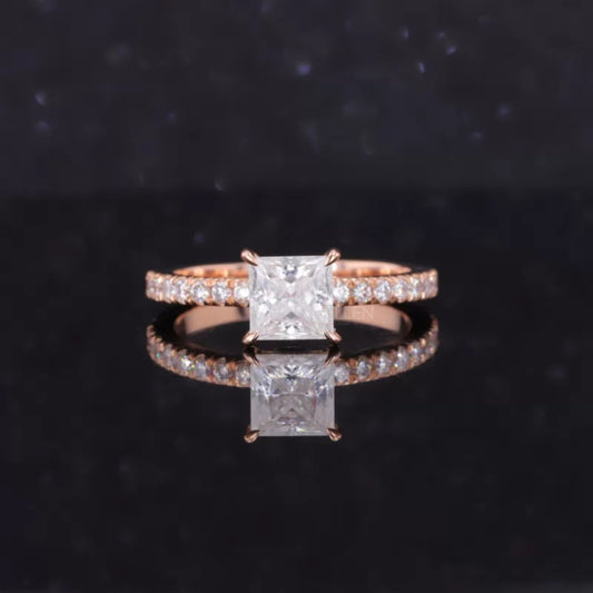 Princess cut moissanite solitaire ring with round diamond-accented shank – regal and refined engagement style

