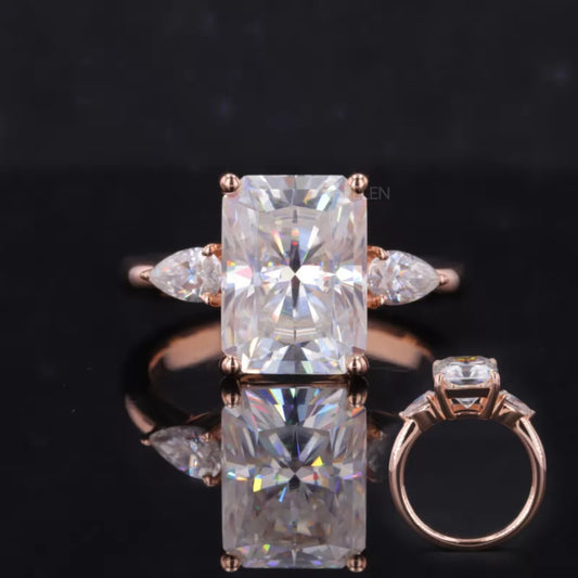 3 stone moissanite ring with radiant center and pear cut side stones in sterling silver – elegant modern engagement ring

