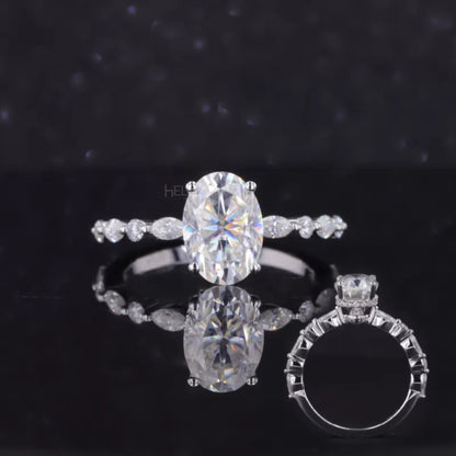 Oval solitaire moissanite ring with hidden halo, marquise and round accents – romantic and graceful bridal piece