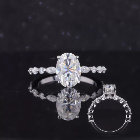 Oval solitaire moissanite ring with hidden halo, marquise and round accents – romantic and graceful bridal piece