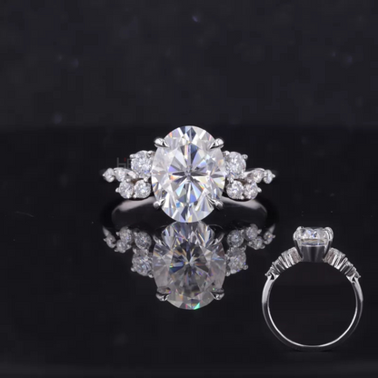 Dainty vintage cluster ring with oval moissanite solitaire – delicate sparkle for romantic brides