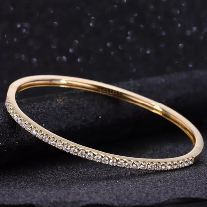 Half bangle bracelet with round cut moissanite in 925 sterling silver – elegant fusion of shine and simplicity

