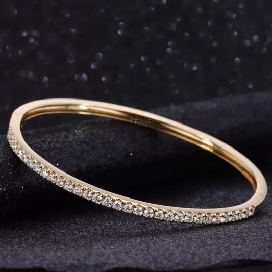 Half bangle bracelet with round cut moissanite in 925 sterling silver – elegant fusion of shine and simplicity

