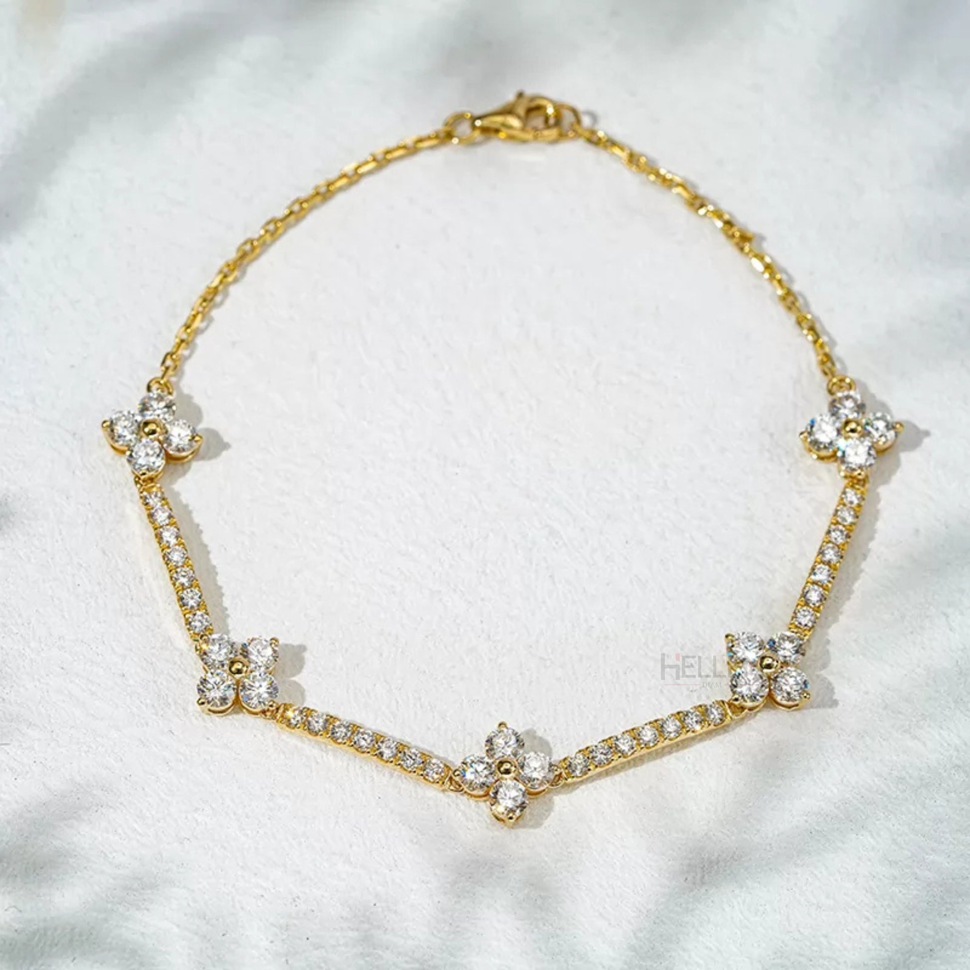 Floral-inspired loose chain bracelet with round cut moissanite – elegant and lightweight wristwear for women


