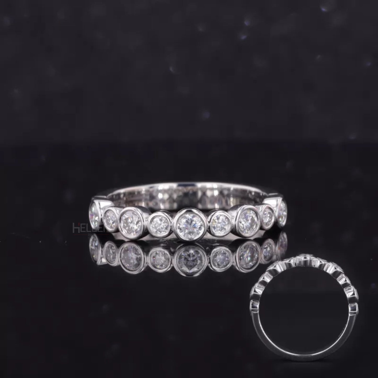 Sterling silver anniversary band with round cut moissanite in bezel setting – sleek and secure brilliance

