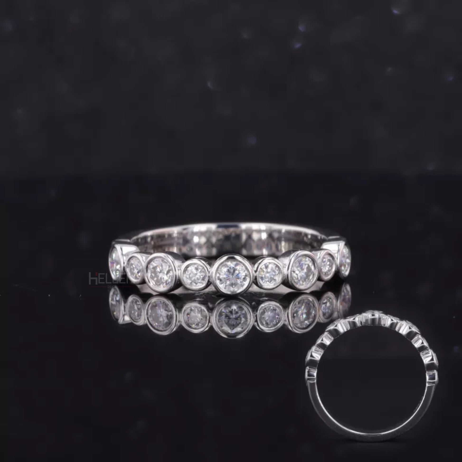 Sterling silver anniversary band with round cut moissanite in bezel setting – sleek and secure brilliance

