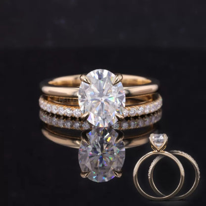 Oval solitaire ring paired with a half-round eternity band – elegant bridal stack set with timeless design

