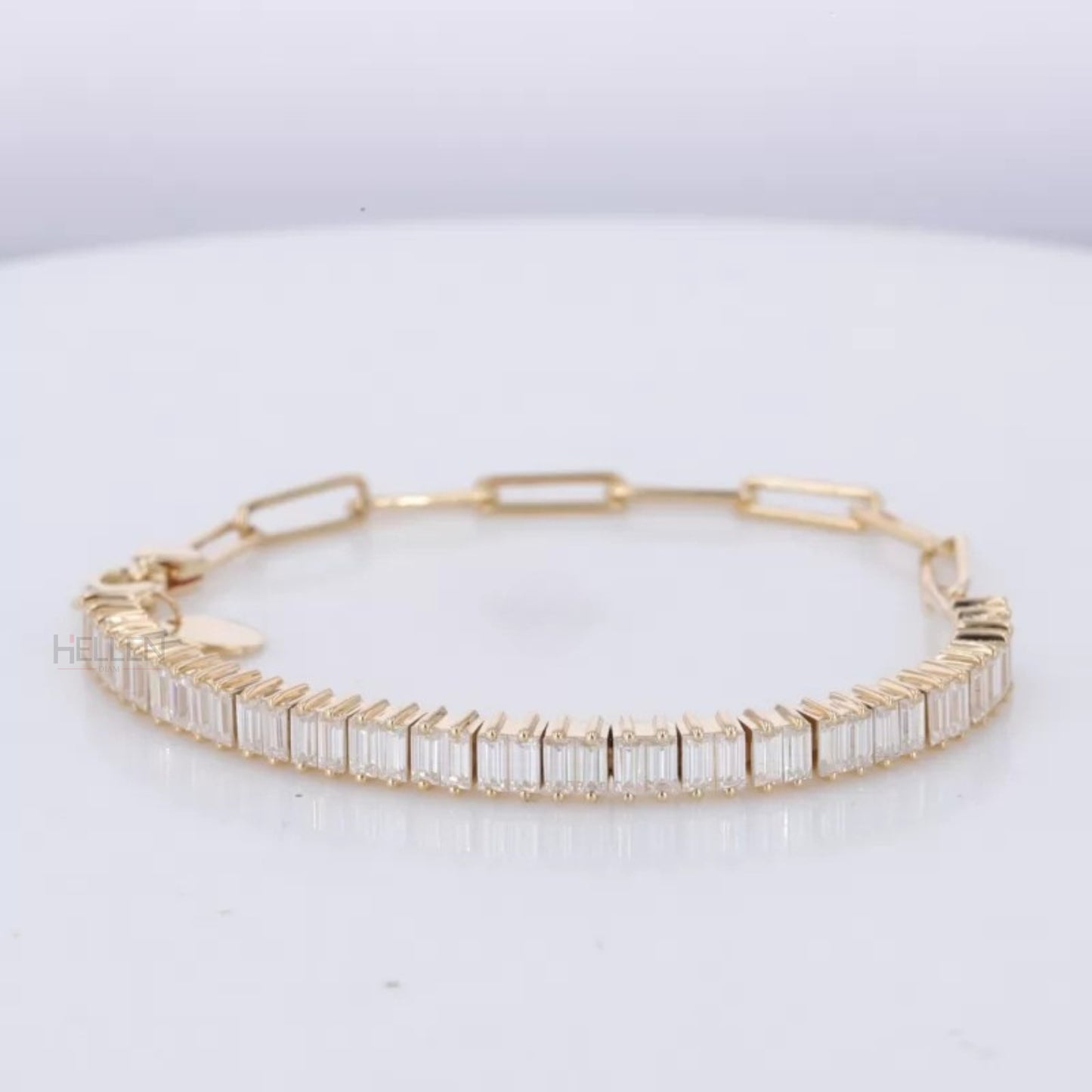 Luxurious mixed bracelet combining baguette moissanite tennis and Italian paper clip chain – elegant statement piece