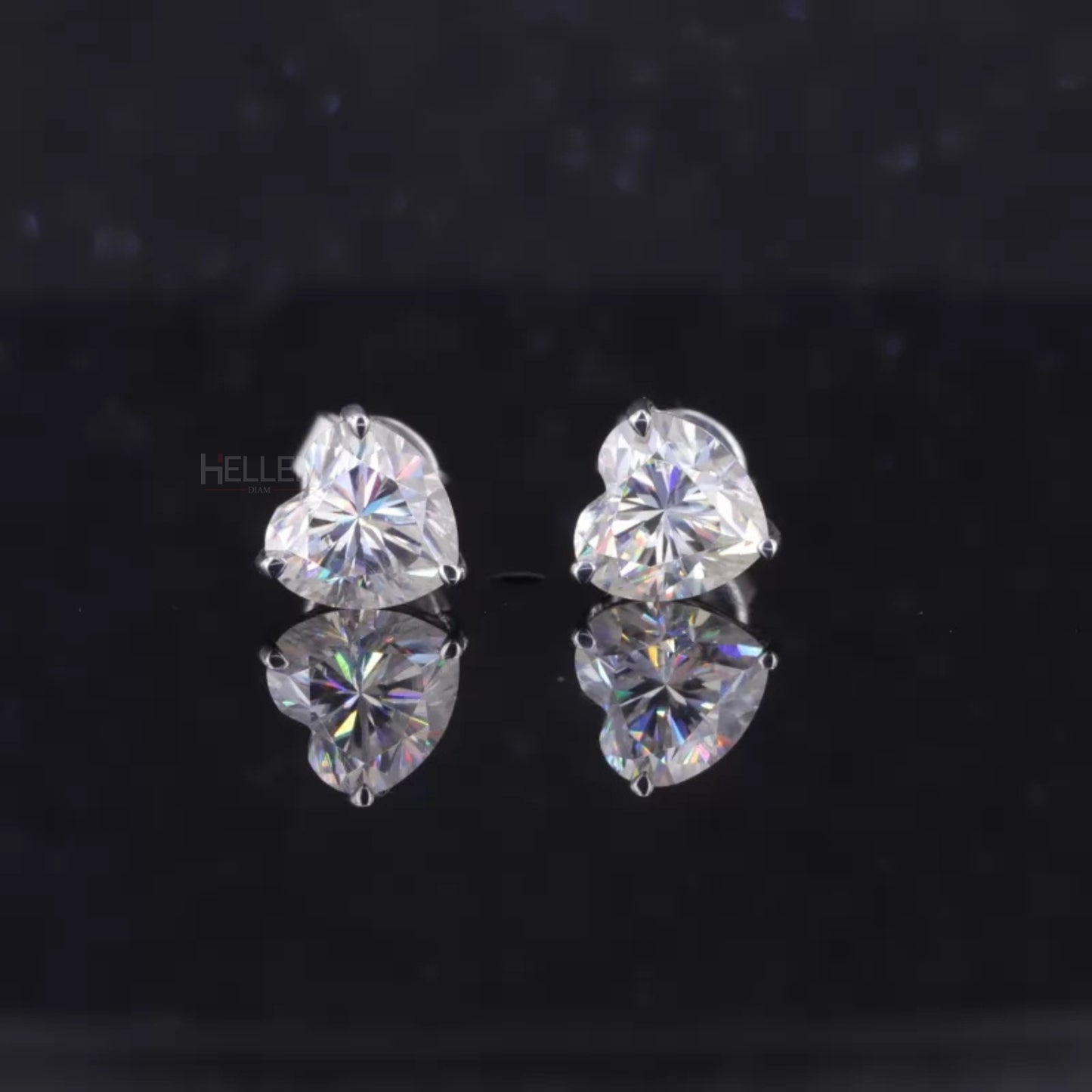 Heart cut VVS moissanite stud earrings with 3-prong setting – romantic sparkle in a secure minimalist design