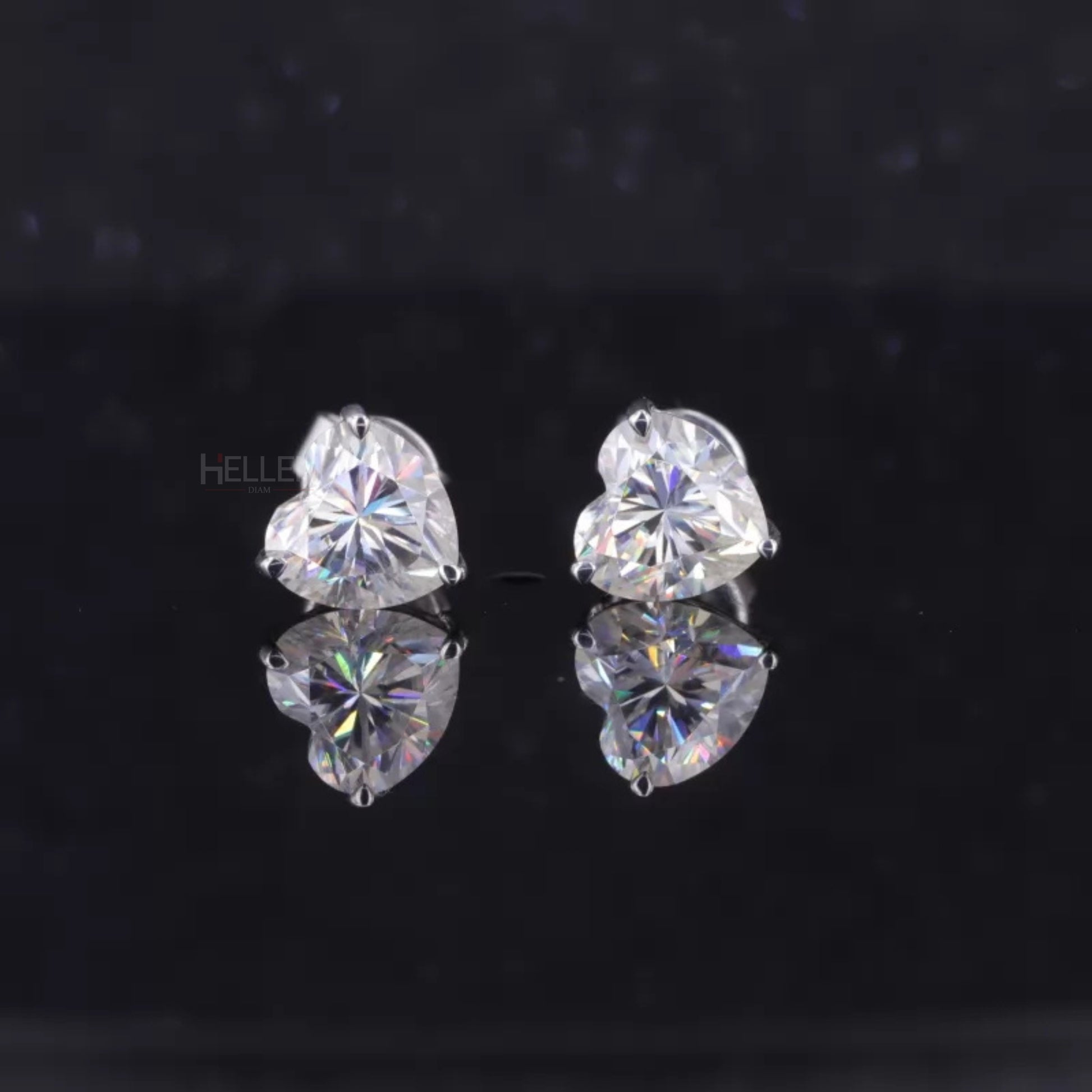 Heart cut VVS moissanite stud earrings with 3-prong setting – romantic sparkle in a secure minimalist design