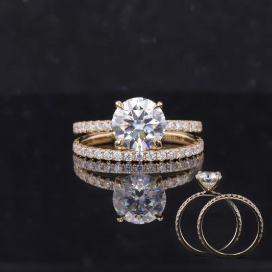 Round cut moissanite solitaire engagement ring set with matching band – timeless and elegant bridal pairing

