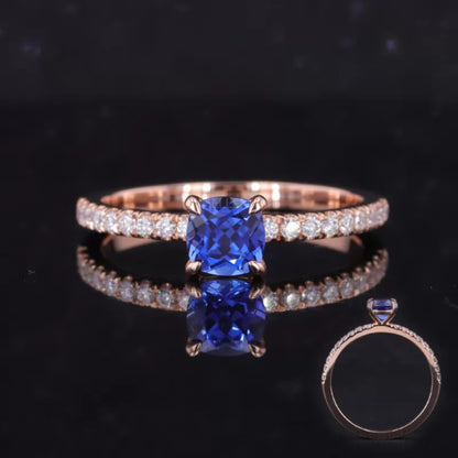 Cushion cut blue sapphire ring with round moissanite – elegant fusion of color and sparkle for proposals