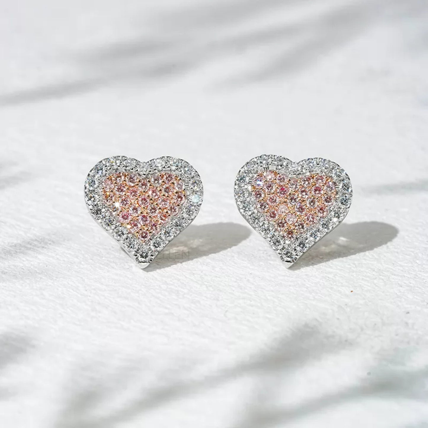 Heart shaped studs with pink gemstone and moissanite – playful and romantic two-tone design

