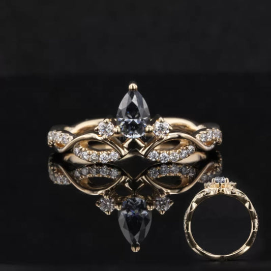 V-curved wedding band with round and salt and pepper pear cut moissanite – edgy and modern pairing band