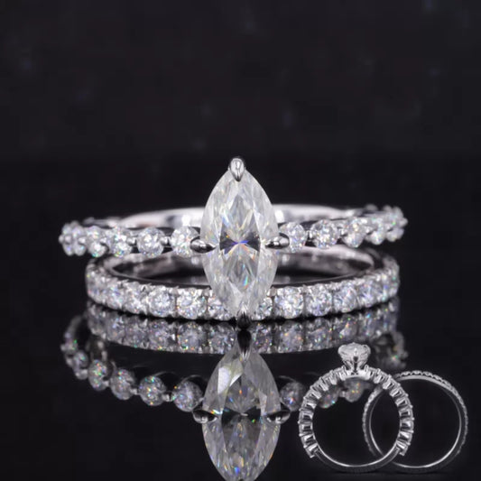 Marquise cut solitaire ring with half-round eternity band – timeless shape paired with sparkling simplicity

