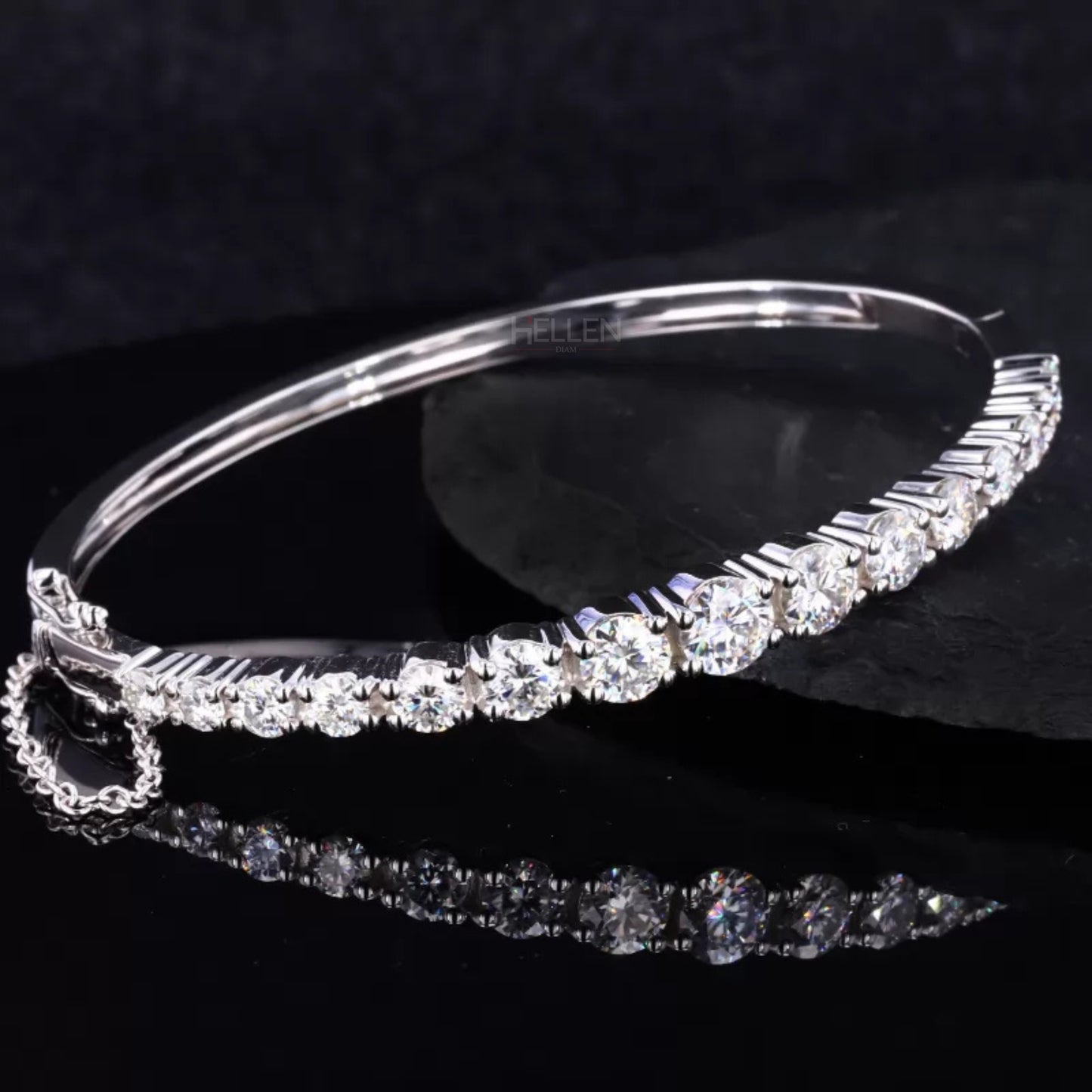 Round cut moissanite bangle bracelet with secure chain lock – refined sparkle with added safety and style

