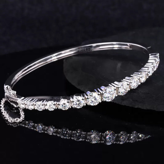 Round cut moissanite bangle bracelet with secure chain lock – refined sparkle with added safety and style

